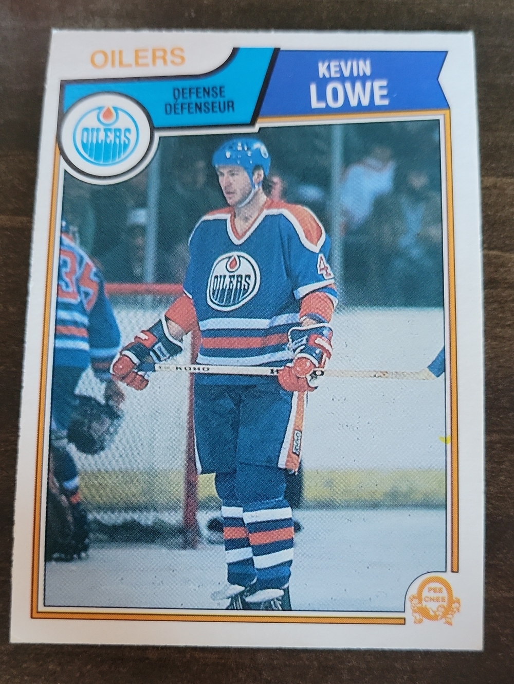1983/84 OPC Kevin Lowe Edmonton Oilers Hockey Card - Blue & Orange